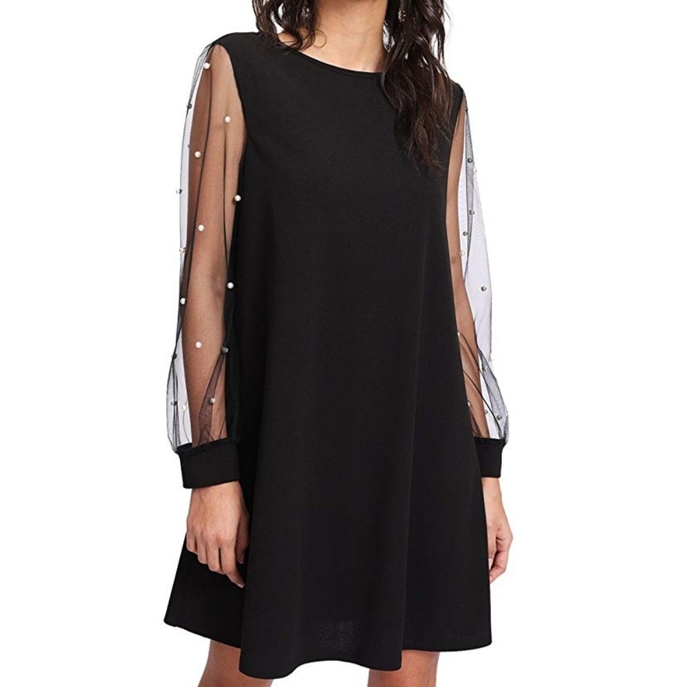 Elegant but fun dress with mesh pearl sleeves